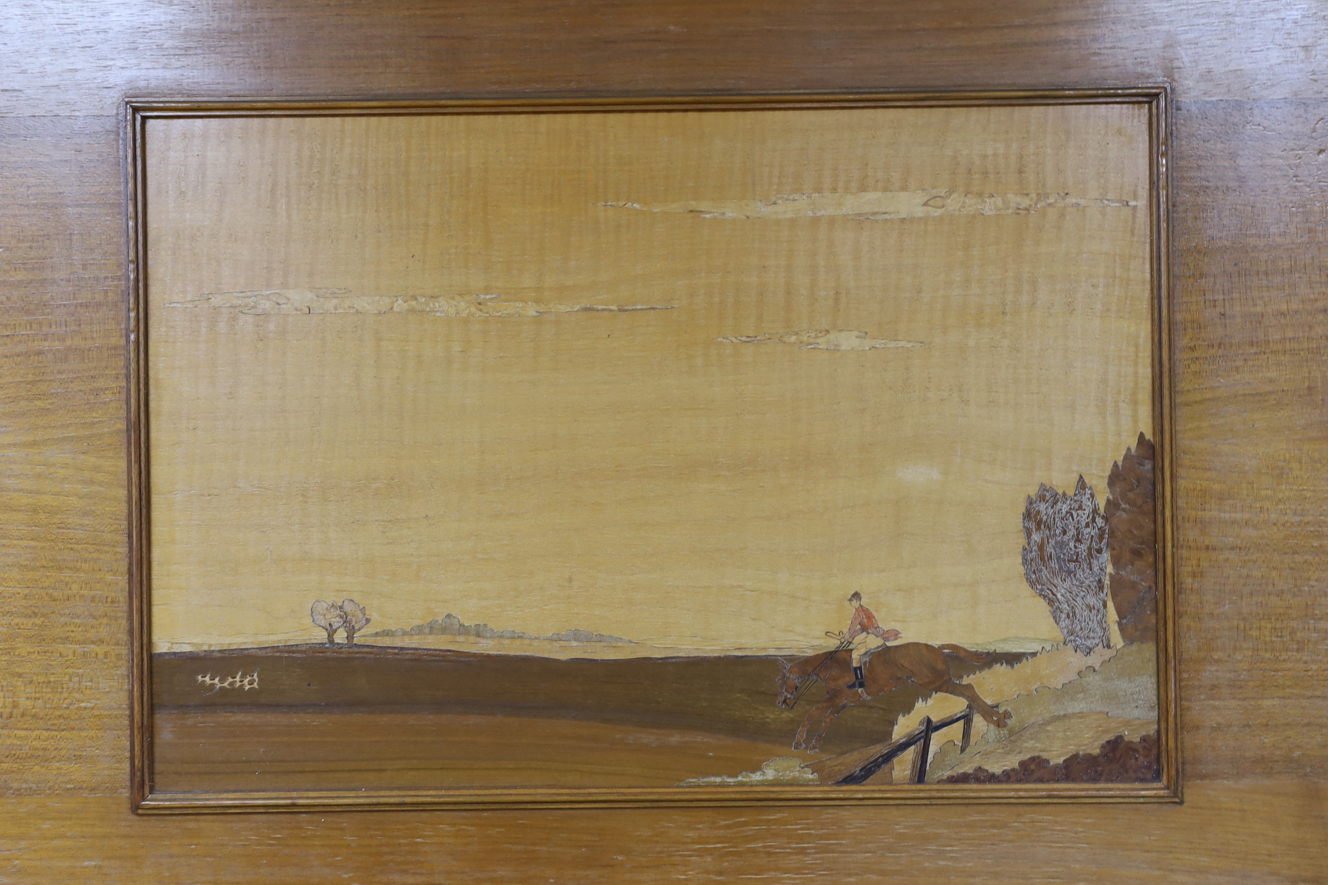 A pair of Rowley Gallery style marquetry panels, depicting hunting scenes, 31 x 48cm, overall 52 x 70cm